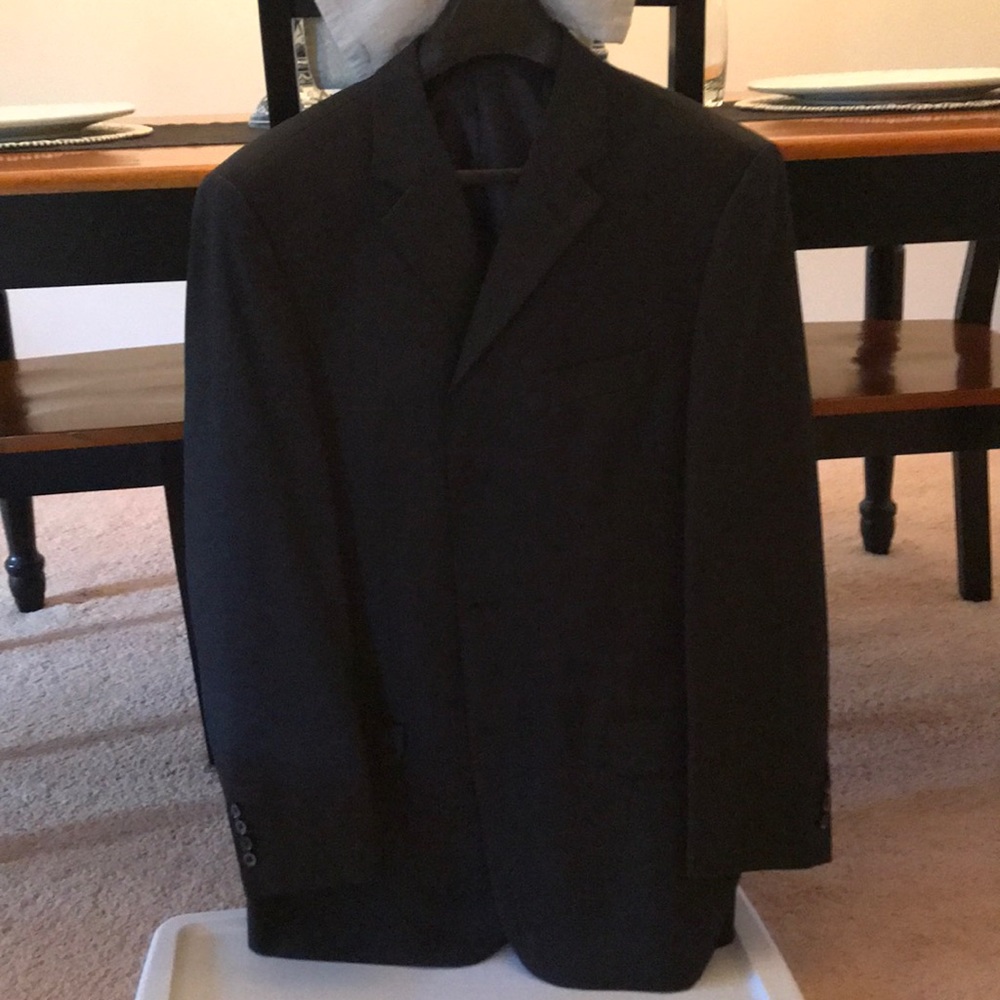 Dark grey suit. Hand tailored fine wool.